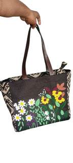 Original dark brown tote bag with colourful floral embroidery and black-and-cream geometric side panels