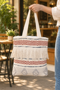 Blue and red tote bag at a cafe