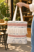 Blue and red tote bag at a cafe